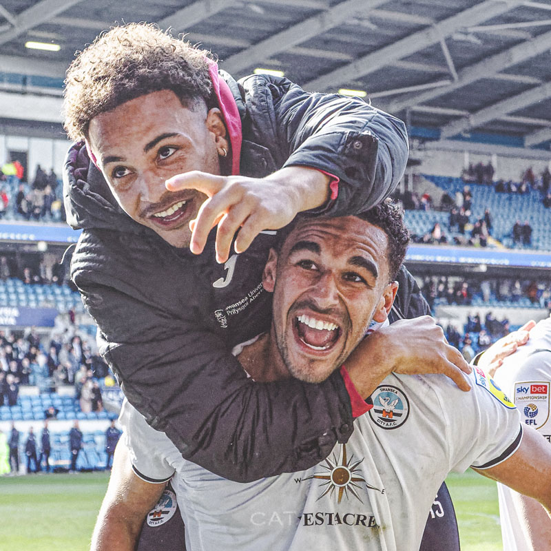 Photograph of Ben Cabango and Matty Sorinola beating Cardiff City