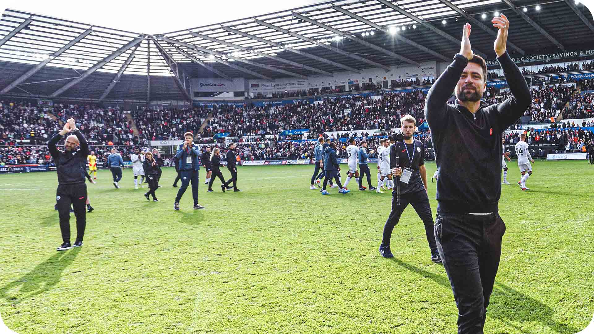 Luke and Russell celebrating beating Cardiff last time at the Swansea.com Stadium