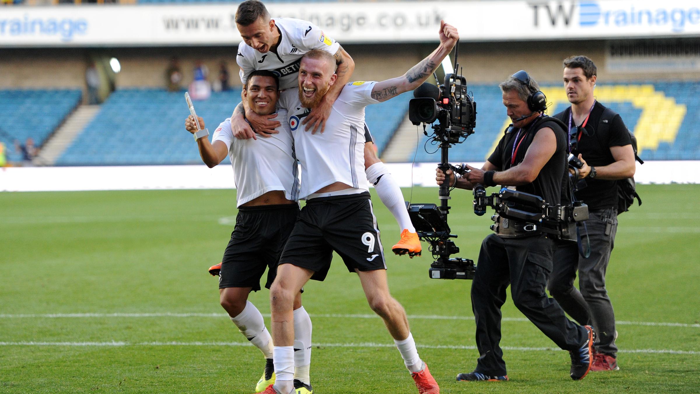 The Swans celebrate after beating Millwall.