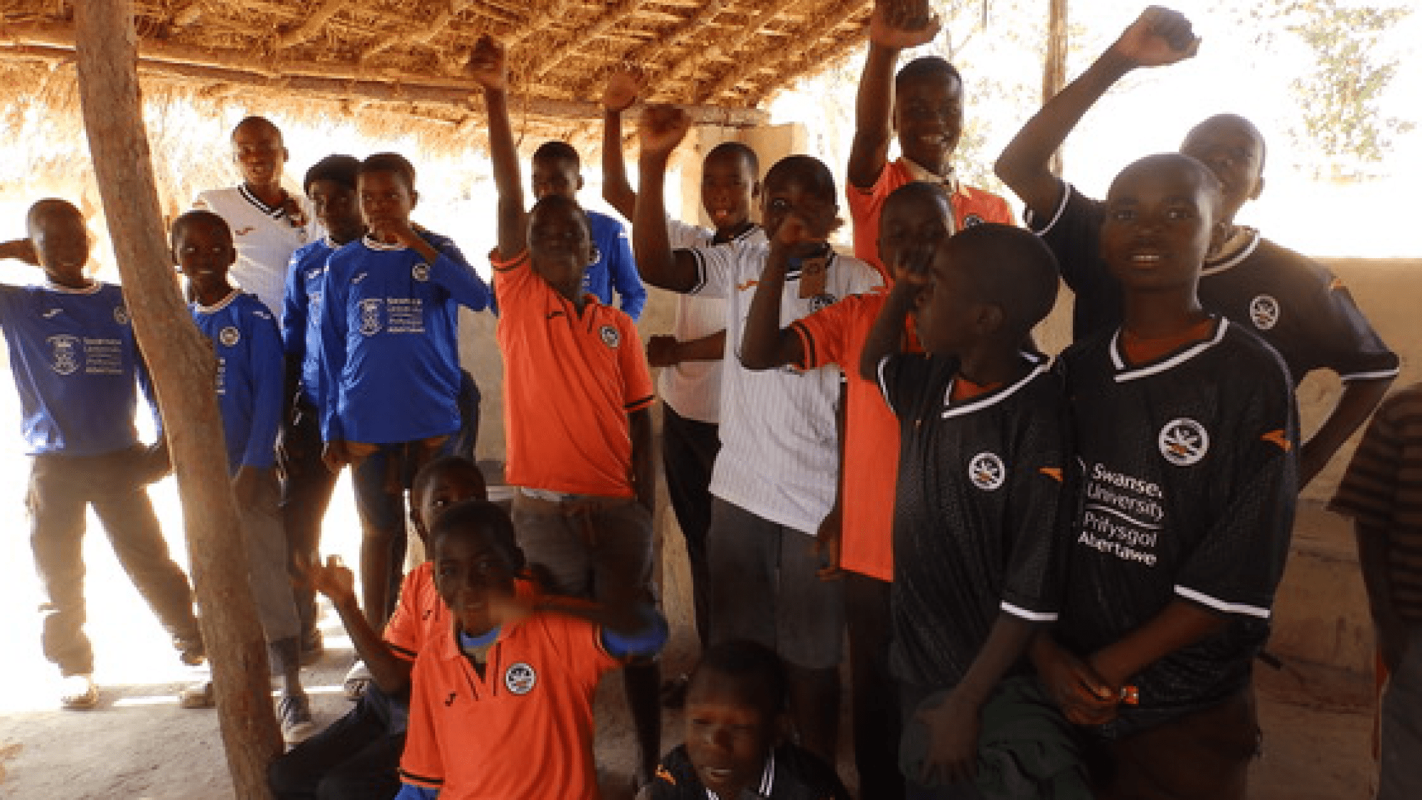 Swansea City fan Emyr provides kit and stationary for Zambian school