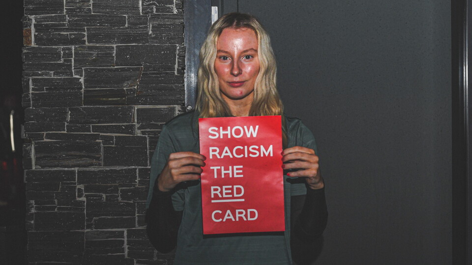 Ladies U19 player with Show Racism the Red Card cards