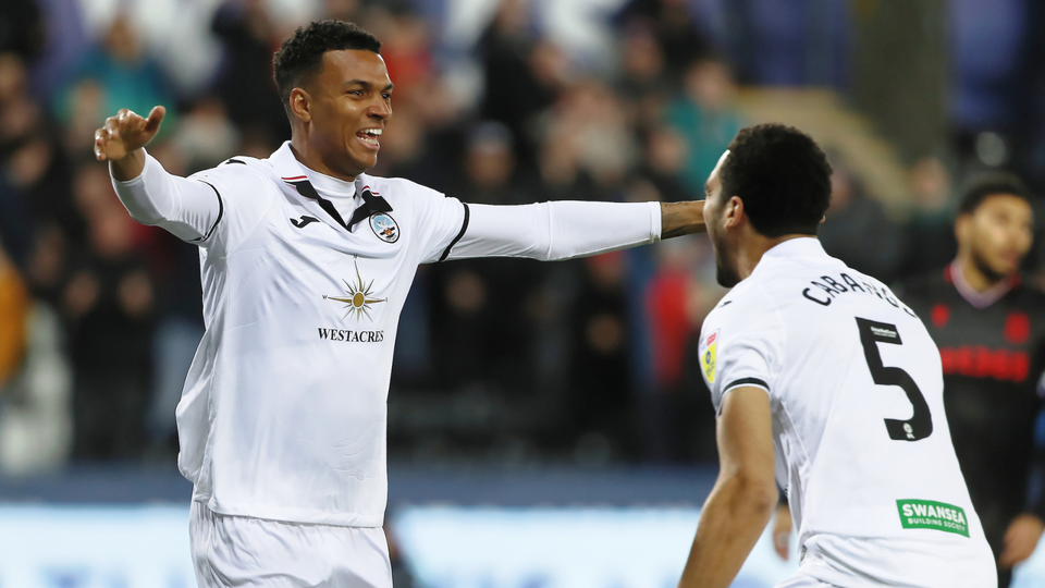Morgan Whittaker celebrates with Ben Cabango