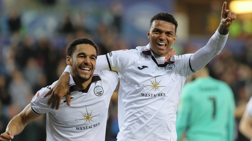 Morgan Whittaker celebrates with Ben Cabango