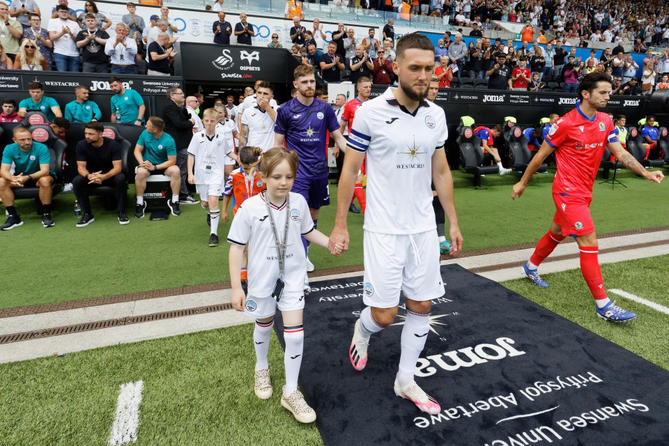 Matt Grimes walk out of the tunnel