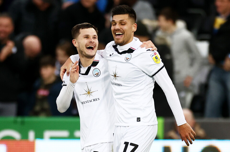 Liam Cullen and Joel Piroe celebrate