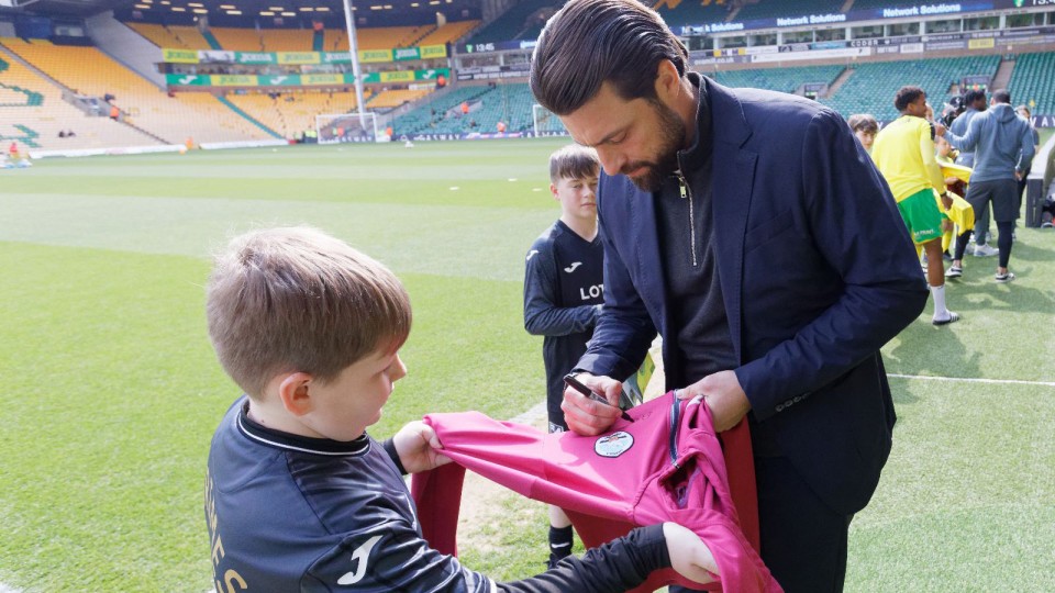 Russell Martin meets the Swansea City mascot
