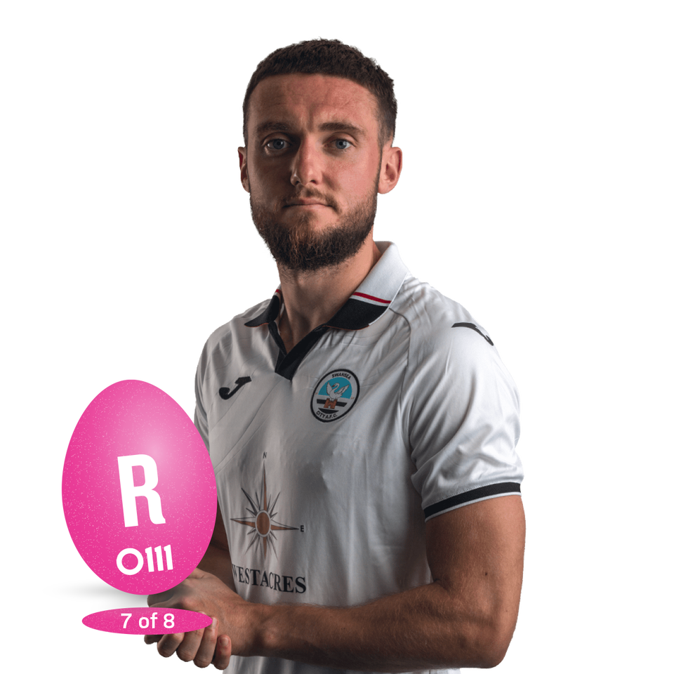 Matt Grimes and an Easter Egg with the letter "R" on it. 