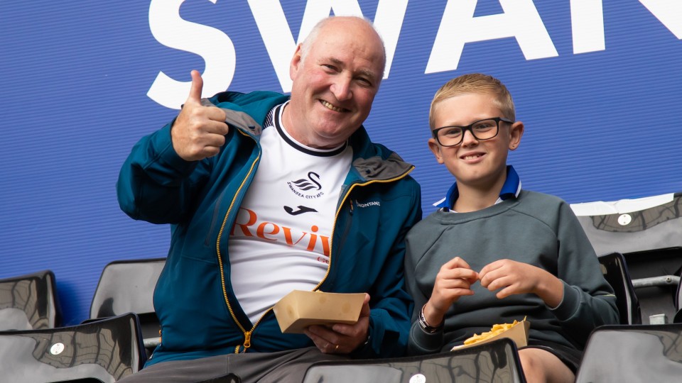 Fans cheer on the Swans against Sheffield Wednesday