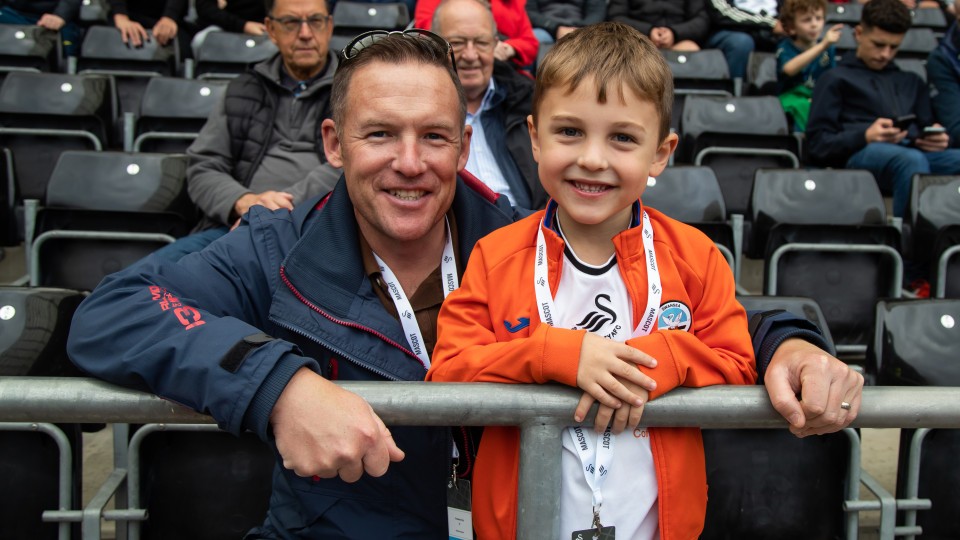 Fans cheer on the Swans against Sheffield Wednesday