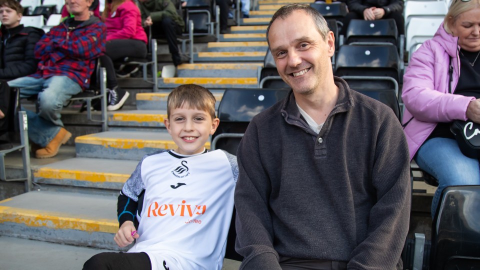 Fans cheer on the Swans against Sheffield Wednesday
