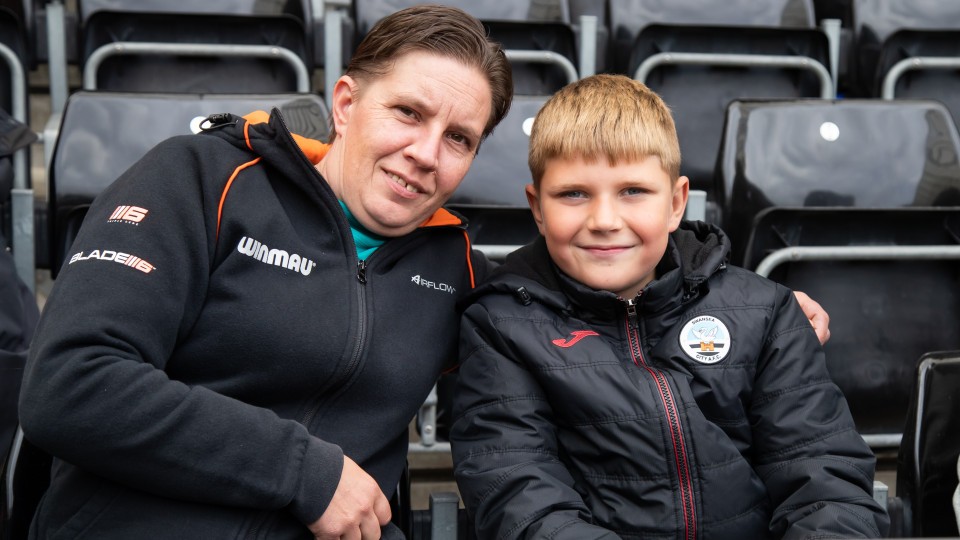 Fans cheer on the Swans against Sheffield Wednesday