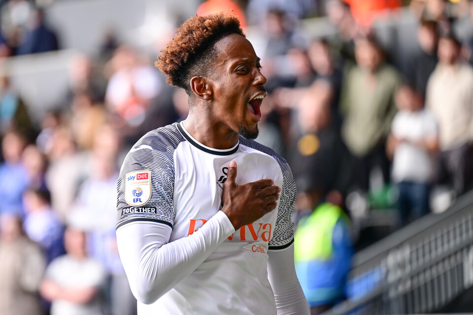 Jamal Lowe celebrates his penalty