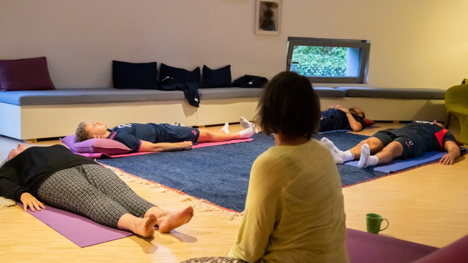 Harry Darling, Lee Trundle and Ollie Cooper take part in Yoga at Maggie's