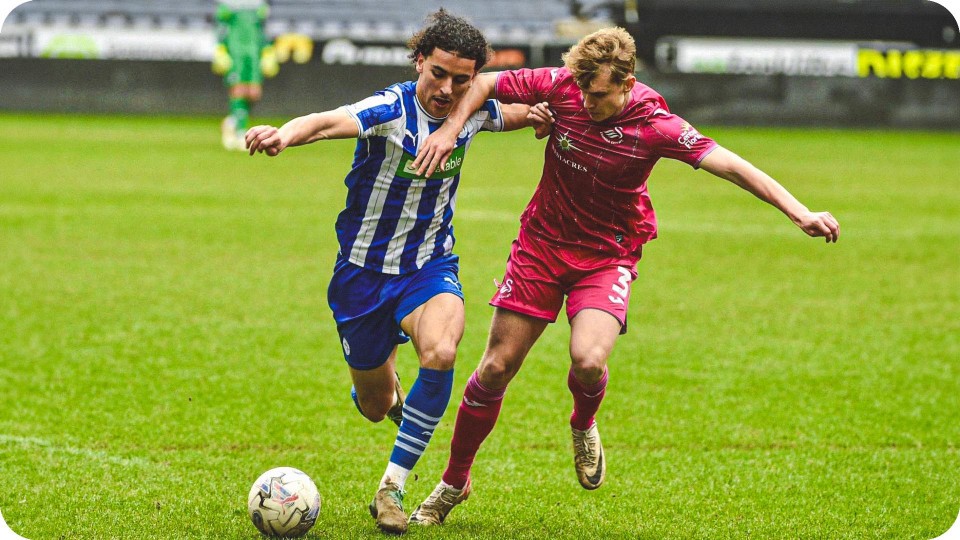 Image of Seb Dabrowski challenging for the ball