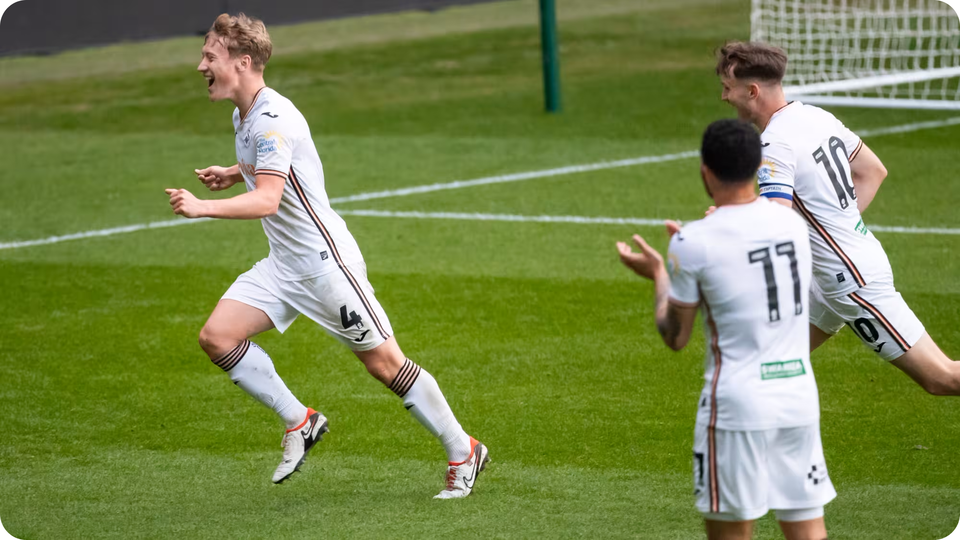 Cook scoring a goal