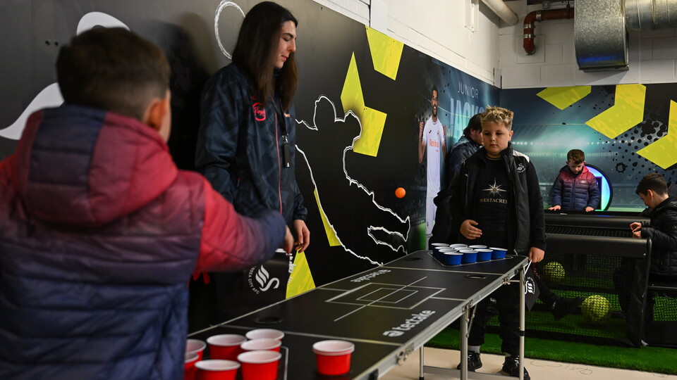 Junior Jacks play games in the family stand