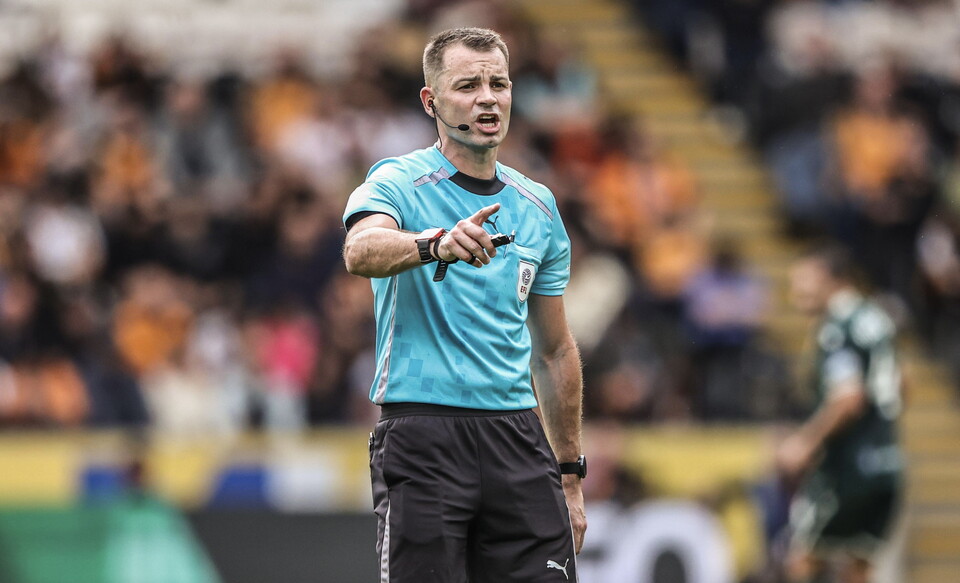 Referee Tom Neild 