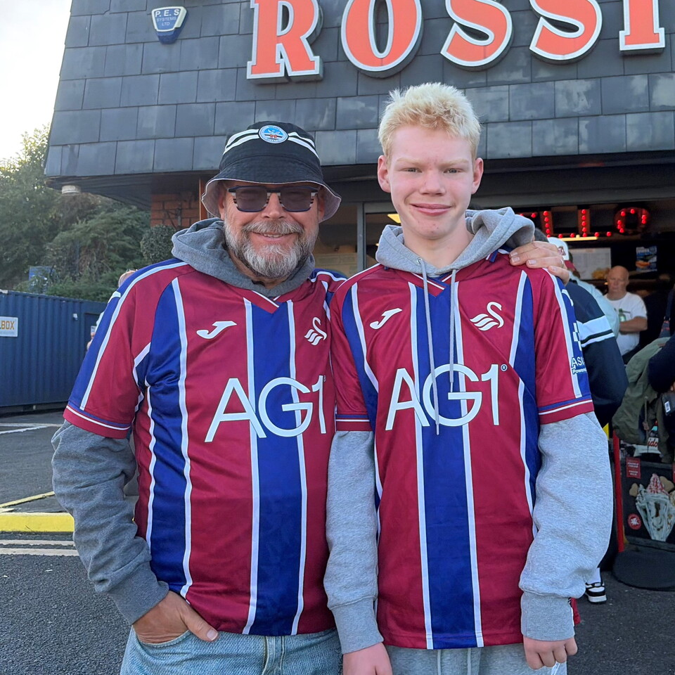 Simon on the left with his son