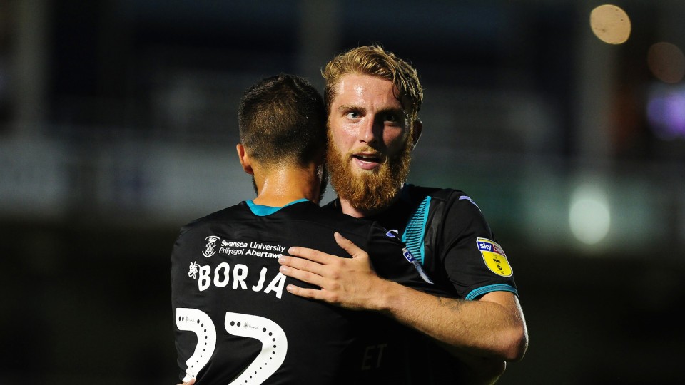 Oli McBurnie and Borja celebrate the win