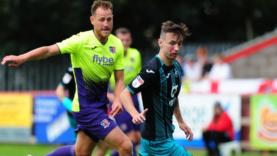 Bersant Celina holds off an Exeter challenge