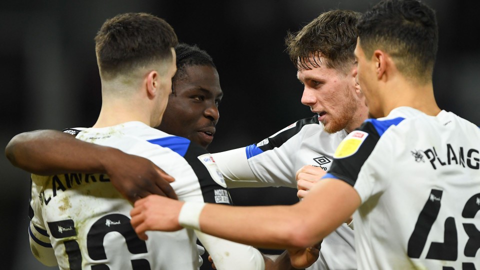 Derby County players celebrate a goal