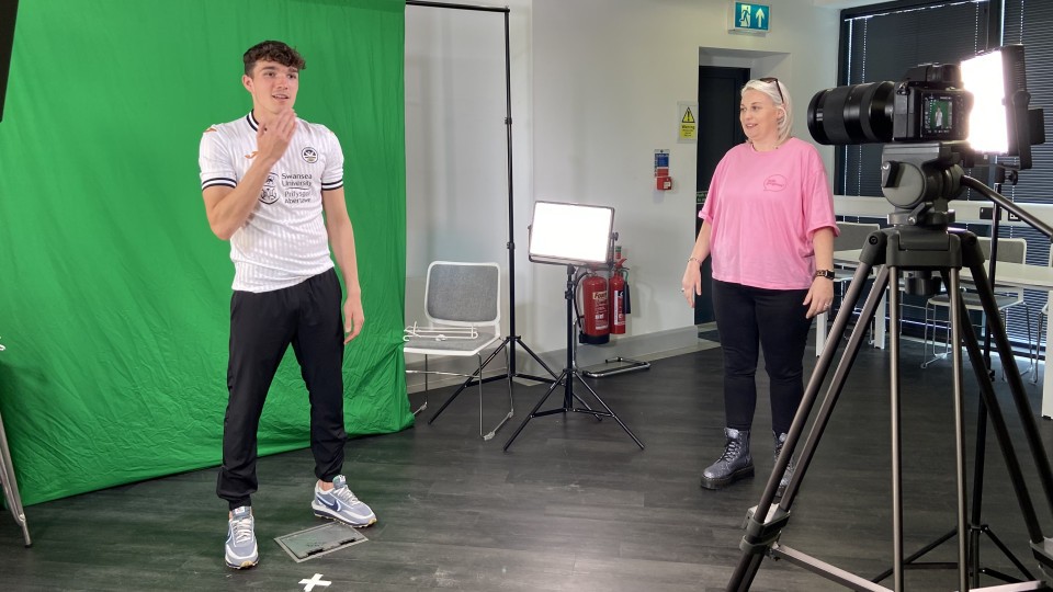 Kyle Joseph signs thank you in BSL