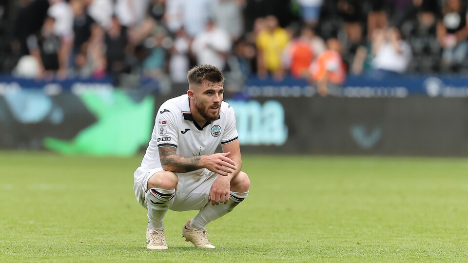 Ryan Manning slumped after defeat to Luton Town