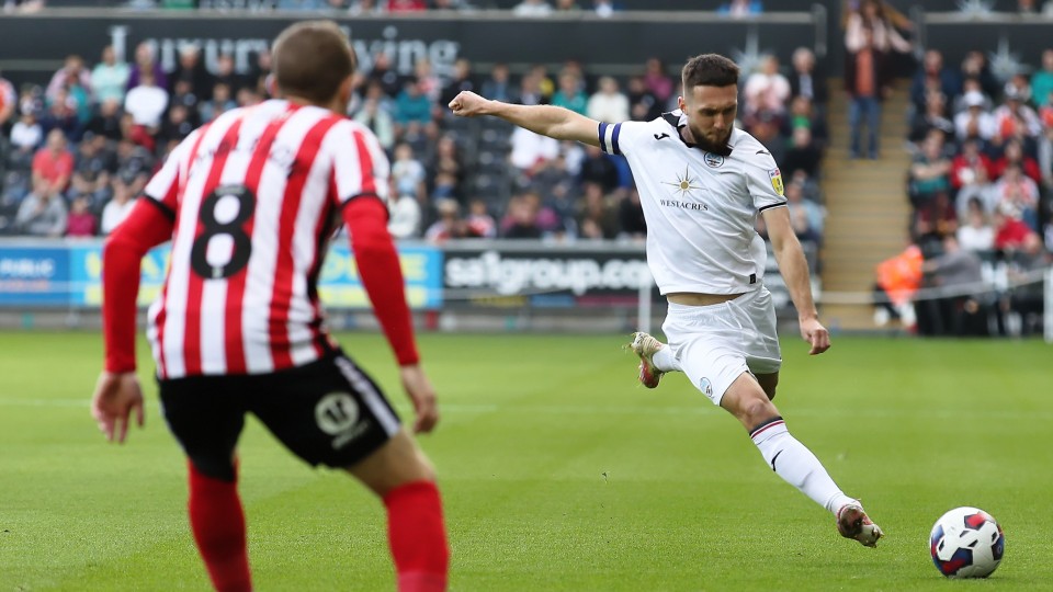 Matt Grimes goes to strike a ball left footed against Sunderland