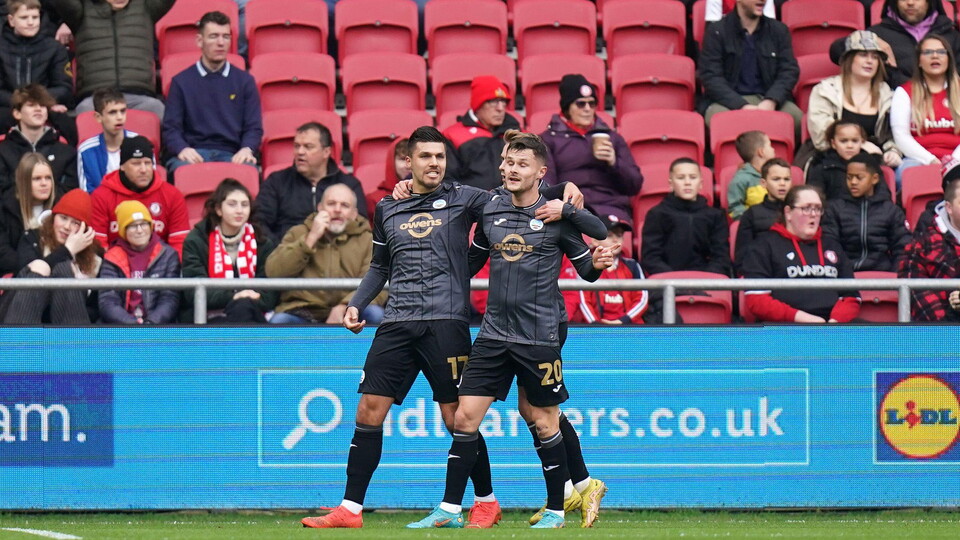 Joel Piroe and Liam Cullen celebrate taking the lead against Bristol 