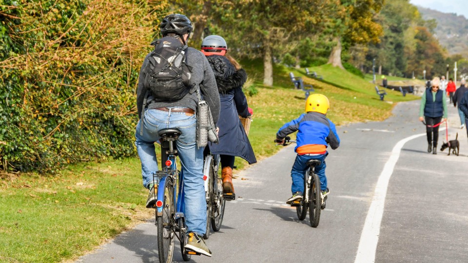 Family cycling in Swansea