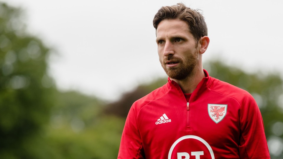 Joe Allen in a Wales tracksuit