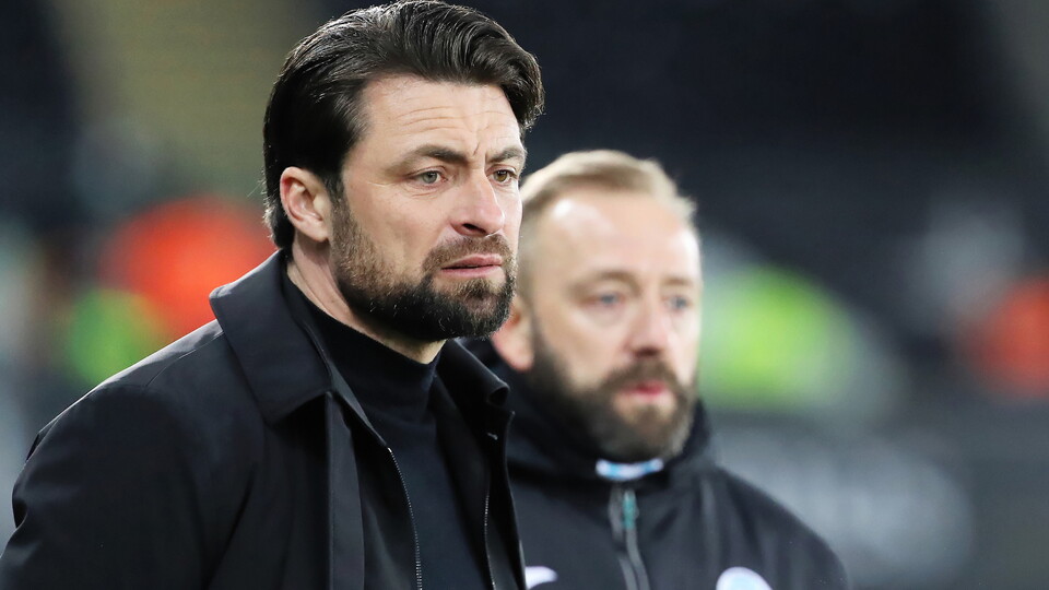 Russell Martin watches from the touchline