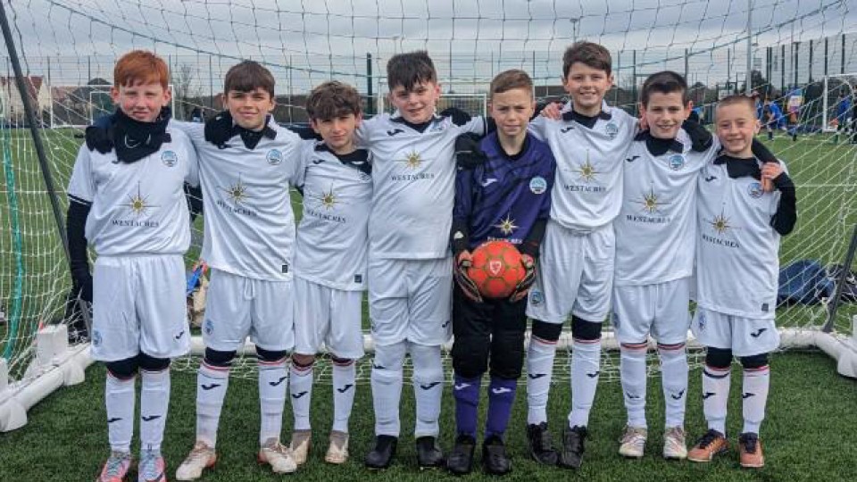 St Joseph's School representing Swansea City at kids tournament