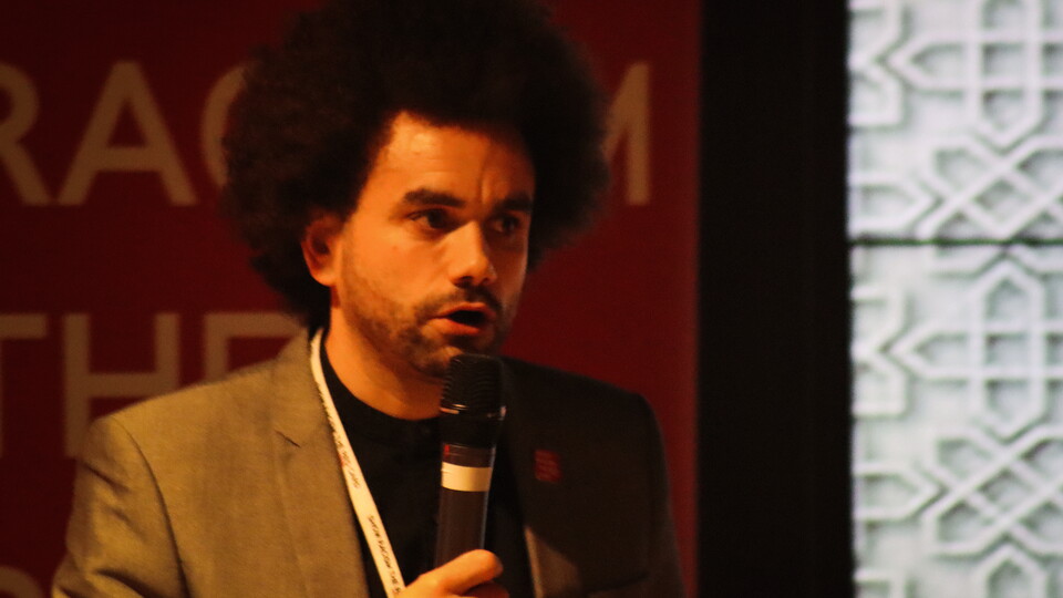 Show Racism the Red Card's Dean Pymble speaking at an Iftar event