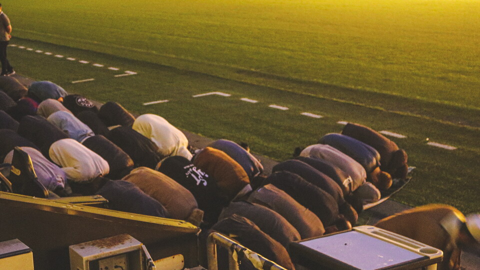 Prayers take place at pitch side