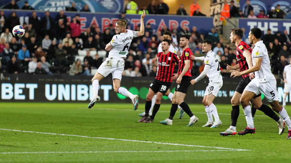 Harry Darling scores a header against Preston North End