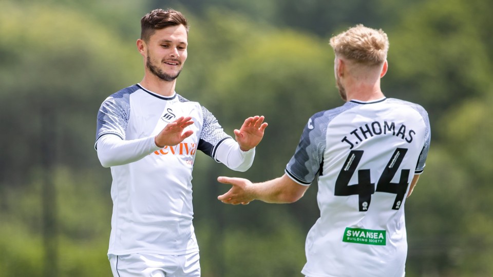 Liam Cullen and Josh Thomas celebrate 