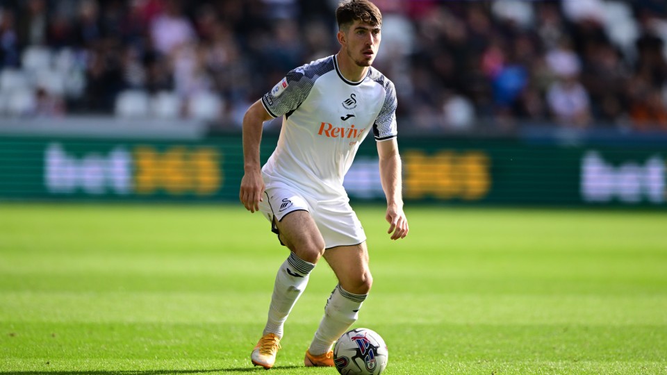 Josh Key stands over the ball 