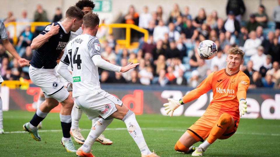 Carl Rushworth makes a save against Millwall