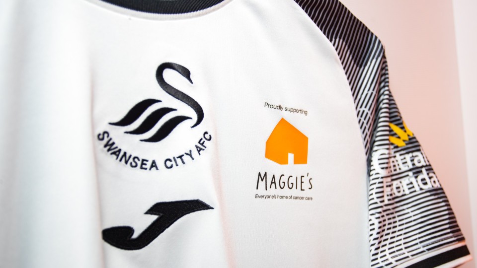 Maggie's badge on shirt