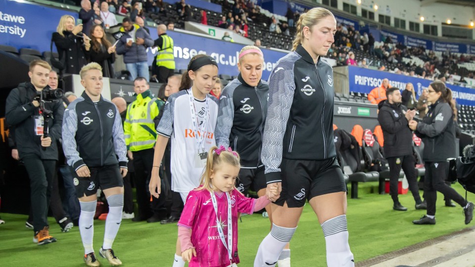 Swans Women v Wrexham players walk out of the tunnel 
