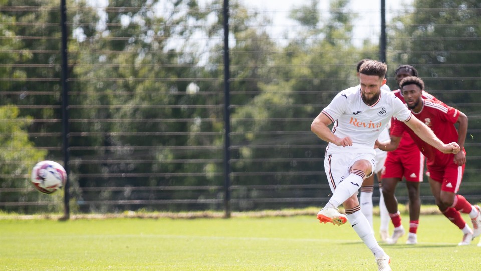 Matt Grimes scores a penalty