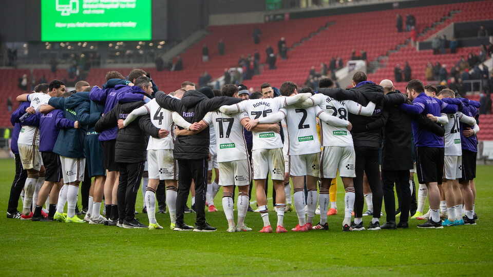 Swansea City huddle