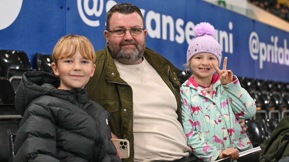 A family of Swansea supporters at the home game against QPR.