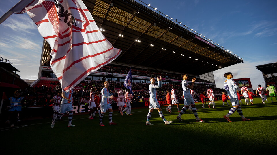 Team walk out Stoke