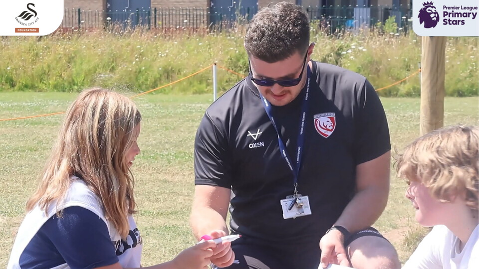 Mr Hughes taking a PE lesson