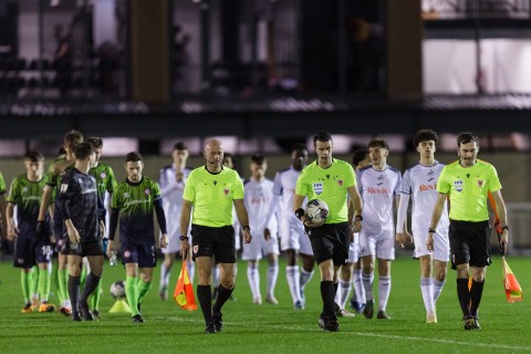 Swansea City U21 and Cardiff Met walk onto the pitch